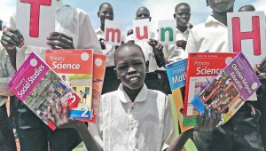 Students_with New Flash Cards and Textbooks_June 2016_Ruweng State Primary School South Sudan 300dpi